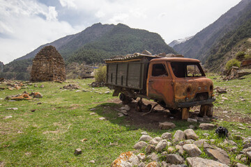 an abandoned car in the mountains. North Ossetia, Caucasus, Russia