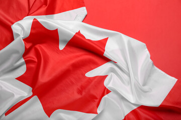 Flag of Canada on red background, closeup