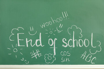 Text END OF SCHOOL with drawings on blackboard