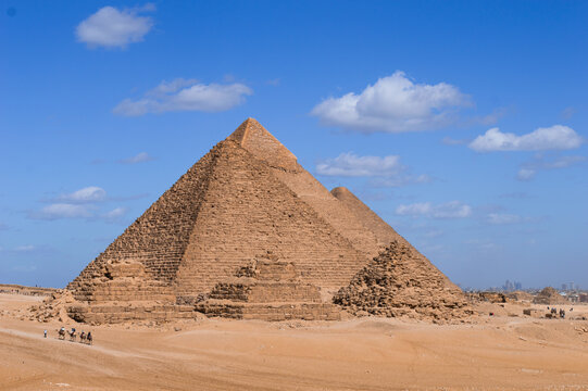 The Great Pyramid of Giza[a] is the largest Egyptian pyramid and the tomb of Fourth Dynasty pharaoh Khufu. Built in the early 26th century BC during a period of around 27 years,[3] the pyramid is the 