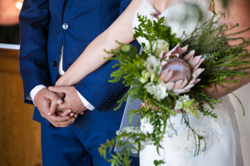 Intimate Moment of a couple Exchanging Wedding Rings at a wedding