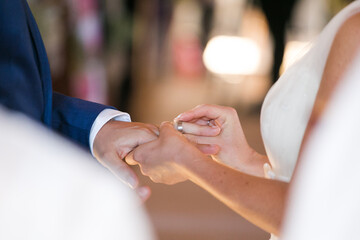 Intimate Moment of a couple Exchanging Wedding Rings at a wedding