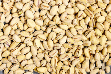 Pistachios texture and background . Tasty pistachios as background, as pistachios texture. flat lay