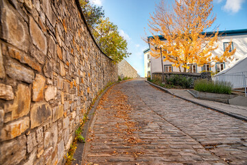 Old street in Quebec city, Canada. Fall season time. - 597889574