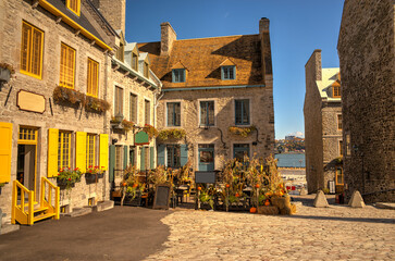 Old buildings in Quebec city, Canada. Fall season time at the end of the day. - 597889582