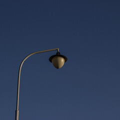 street lamp on blue sky background