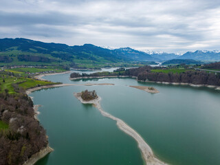 Fototapeta na wymiar Beautiful Lake Gruyere in Switzerland from above - travel photography
