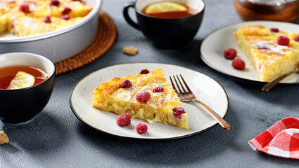 Fresh baked sweet Filo Pastry pie with raspberry and powdered sugar.
