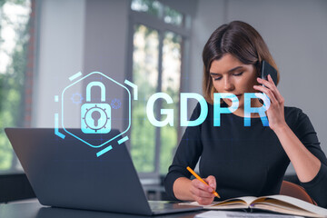 Pensive attractive beautiful businesswoman in formal wear working on laptop at office workplace in background. Concept of data protection information technology. lock icon hologram. talking phone.