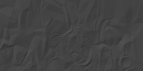 Black crumpled paper texture background. Creative background with scattered overlay of crumpled black paper. A crumpled sheet of black paper abstract background.