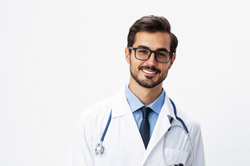 Fototapeta premium Male smile doctor in a white coat and eyeglasses and a stethoscope looks at the camera on a white isolated background, copy space, space for text, health