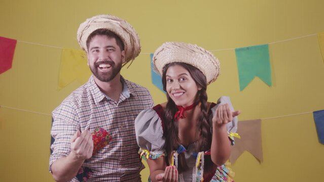 Brazilian couple, dressed in Junina party clothes, S&atilde;o Jo&atilde;o party. Protocol scenes.