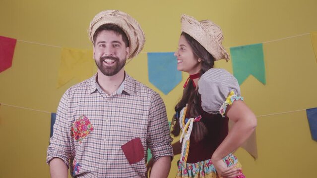 Brazilian couple, dressed in Junina party clothes, S&atilde;o Jo&atilde;o party. Protocol scenes.