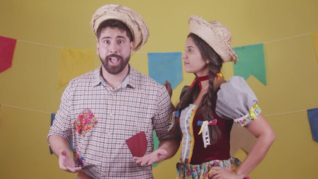 Brazilian couple, dressed in Junina party clothes, S&atilde;o Jo&atilde;o party. Protocol scenes.