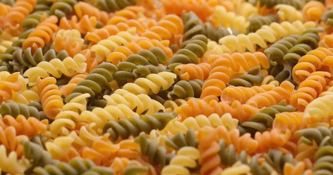 pasta backgroud - macro view of Dry Authentic Italian fusilli