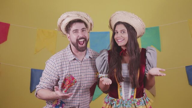 Brazilian couple, dressed in Junina party clothes, S&atilde;o Jo&atilde;o party. Protocol scenes.