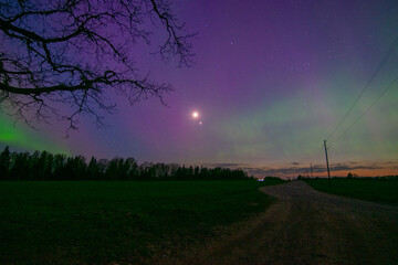 northern lights and its reflection the lake, northern lights shimmer over the lake, northern lights...