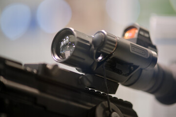 Fototapeta na wymiar Optical sight on a sniper rifle. Optical sight on the weapon