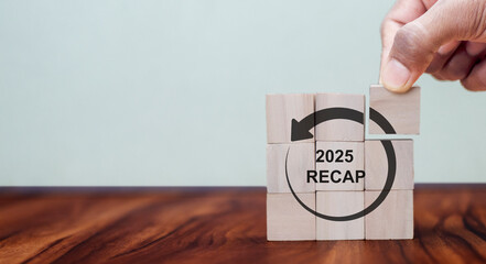 2025 Recap economy, business, financial concept. For business planning. RECAP word icon on wooden cubes on smart grey background and copy space copy