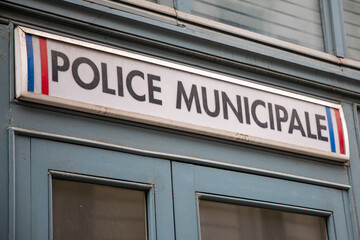 Fototapeta na wymiar police municipale station Municipal police facade wall logo and text sign on entrance official building of mayor local in france
