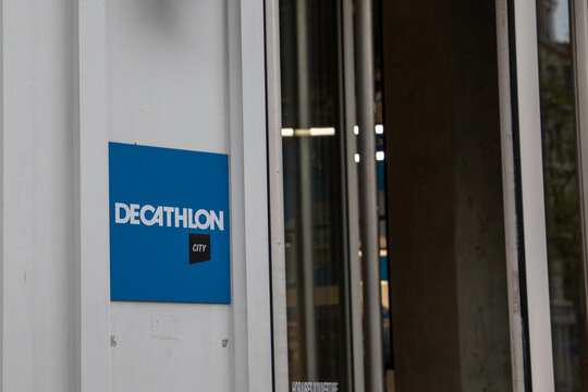 decathlon city sign text and brand store logo entrance facade of shop building center town
