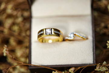 Close-up view of gold diamond wedding rings