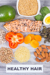 Various nutritious products or ingredients containing vitamins and minerals for healthy and lush hair