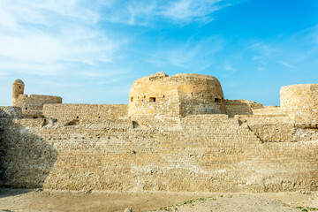 Walls and towers of Qalat al-Bahrain portuguese fortress, Manama, Bahrain