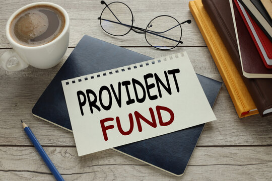 blue notepad with text on a torn page. Provident Fund
