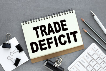 TRADE DEFICIT text on an open notepad. business concept