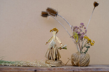 ritual doll made of straw, grass in honor rich harvest, scarecrow for fertility, old toy, amulet...