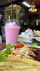 breakfast in the cafe Steak with Pink milk frappe
