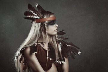 Profile portrait of female shaman - 597986127