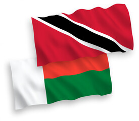 Flags of Republic of Trinidad and Tobago and Madagascar on a white background