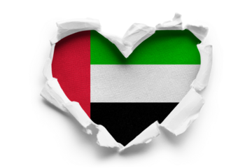 Heart shaped hole torn through paper, showing satin texture of flag of United Arab Emirates, cut out