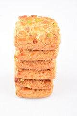 Stack of pistachio biscuit isolated on white background