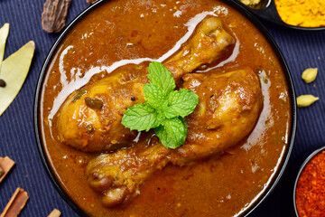 Closeup of indian style chicken curry in bowl