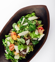Delicious fresh salad on plate, closeup