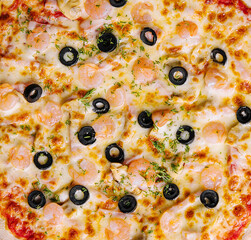 Seafood pizza with shrimps top view