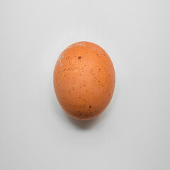 Single brown hen egg isolated on white background close up. Birth and new life concept.