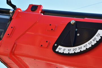 Boom angle indicator. Crane red boom with gravity angle finder.