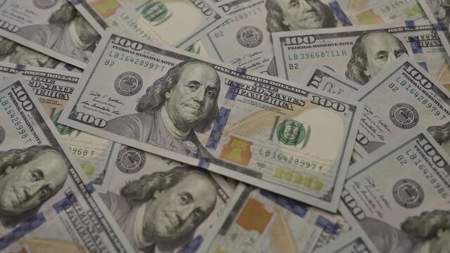 Closeup background of US Currency in 100 dollar banknotes