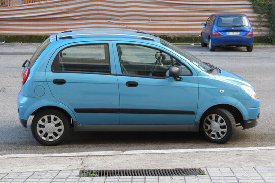 light blue Chevrolez Matiz car