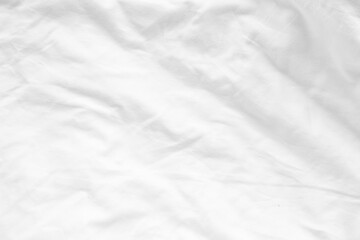 White bed sheet background, wrinkled duvet, crumpled blanket comforter cloth used in hotel, resort...
