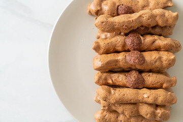 chocolate meringue stick on plate