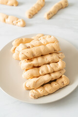 almonds meringue stick on plate