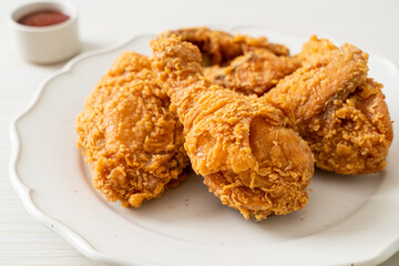 fried chicken with ketchup on plate