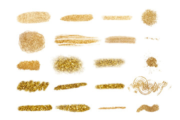 Collection of golden paint strokes to make a background for design. Set of gold brush