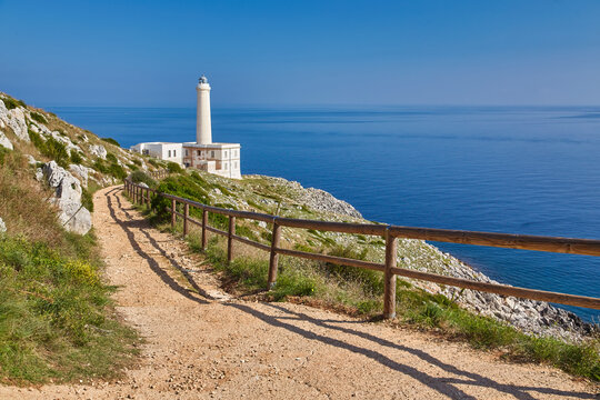 Scenic view of cliff path on the sea Punta Palascia lighthouse on background. Otranto, Lecce