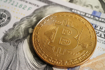 Golden bitcoin on US dollar banknotes money for business and commercial, Digital currency, Virtual cryptocurrency, blockchain technology.